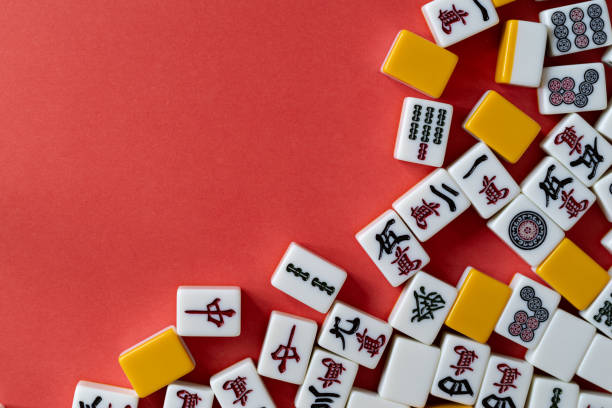 istock mahjong tiles on red background 2024972876