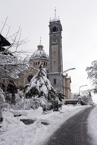The Zurich Enge bell tower captured on a winter day after heavy snowing.