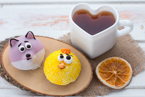 funny cakes with funny faces. Sweet dessert for children