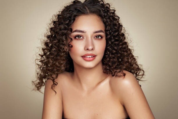 istock Beautiful smiling woman with afro curls 2025030032