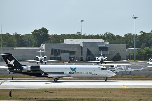 Cancun International Airport - July 25: XA-MCN TUM AeroCarga Bombardier CRJ-200LR airplane on July 25, 2023 in Cancun International Airport, Cancun, Mexico