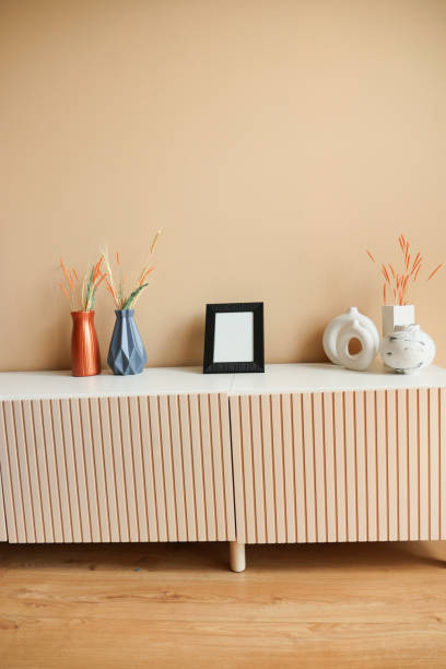 istock empty photo frame on tv cabinet against wall 2025047362