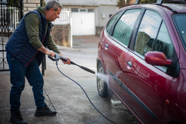 istock DIY, the man washes the car himself 2025049489