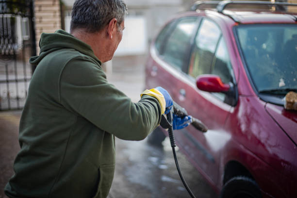 istock DIY, the man washes the car himself 2025049551