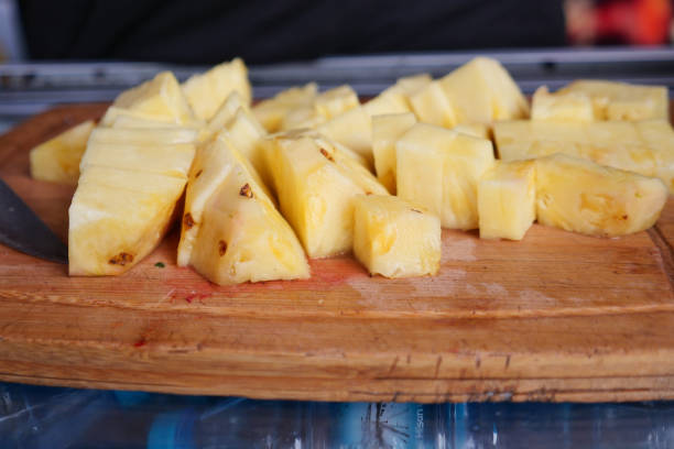 istock slice of pineapple on a chopping board 2025050577