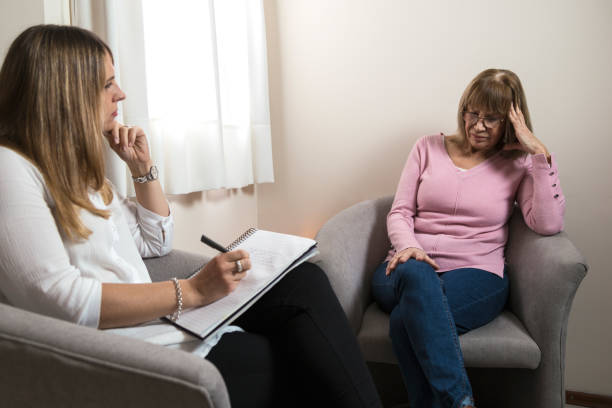 istock Psychologist in his office attending to a patient and taking note. 2025057042
