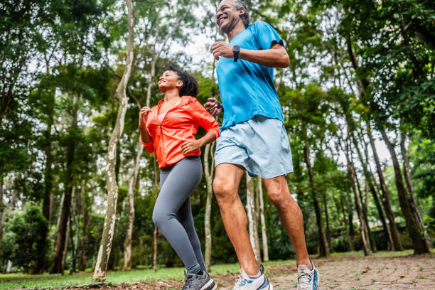 istock Father and daughter running on the public park 2025079065
