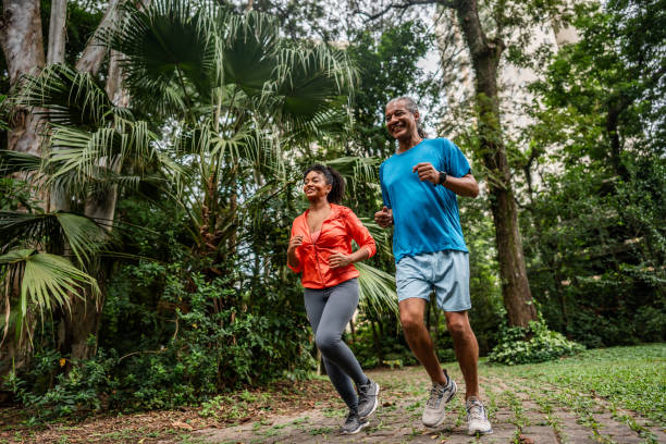 istock Father and daughter running on the public park 2025079481
