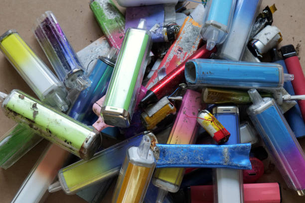 istock Collection of discarded vapes on a cardboard background 2025083915
