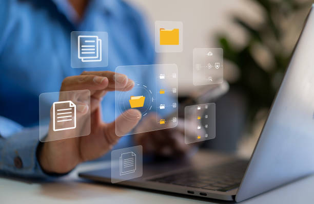 istock Human use laptop with online cloud document file management, information, system, DMS, online documentation database, manage files, enterprise with ERP.search and manage document business technology 2025134171
