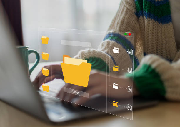 Human use laptop with online cloud document file management, information, system, DMS, online documentation database, manage files, enterprise with ERP.search and manage document business technology