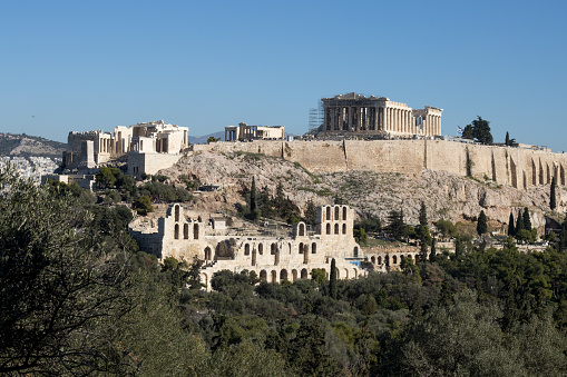 Cariatides Porch, Erechtheion on Acropolis of Athens, blue sky background. Stock photo.