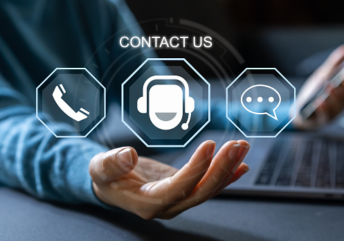 Human holding with call center on screen contact us, email, address, operator, customer, suppor, phone services agen, customer support hotline.contact us concept