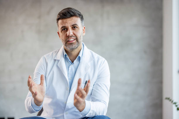 istock Cheerful male doctor shares advice during web conference 2025171246