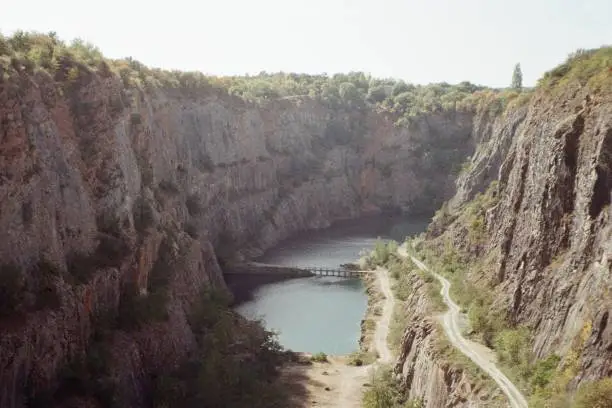 Photo of quarry Velka Amerika 2. October 2023 in analogue photo - blurriness and noise of scanned 35mm film were intentionally left in image