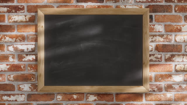 Chalkboard in a wooden frame hanging on a brick wall, looping mockup