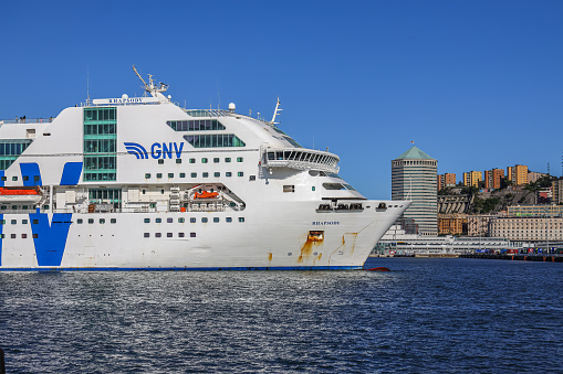 Genoa, Italy- August 7,2023: GNV ferry ship anchored in Genoa port, Italy. Grandi Navi Veloci （GNV） is an Italian shipping company, based in Genoa.