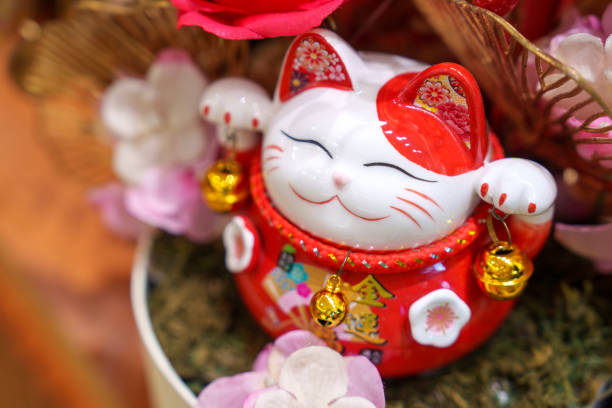 istock Maneki neko cat waving with paw, high angle view. 2025233695
