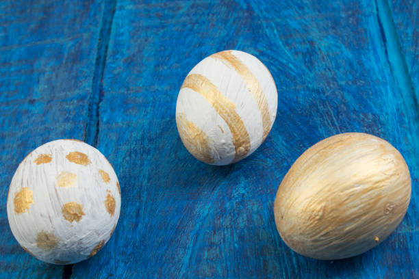 istock Happy Easter. Painted eggs on wooden table. Top view. Copy space for text. 2025242831