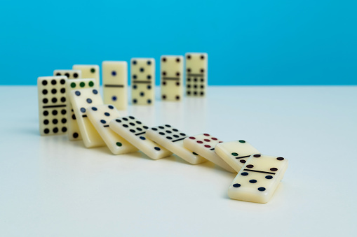 Dominoes falling in a row