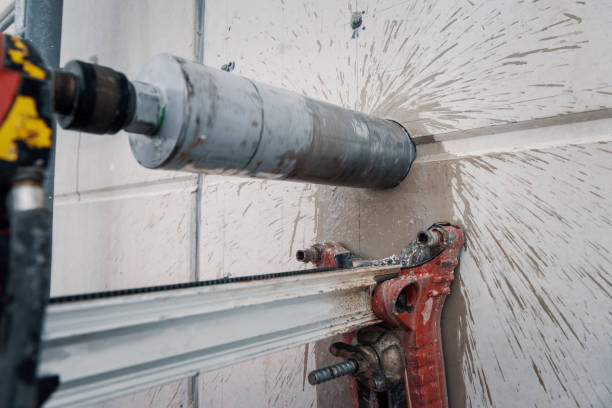 istock Drilling a hole into a concrete floor with core driller 2025252220