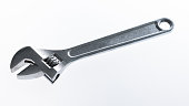 Adjustable wrench on white background