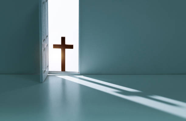 istock Open door with a religious cross 2025257276