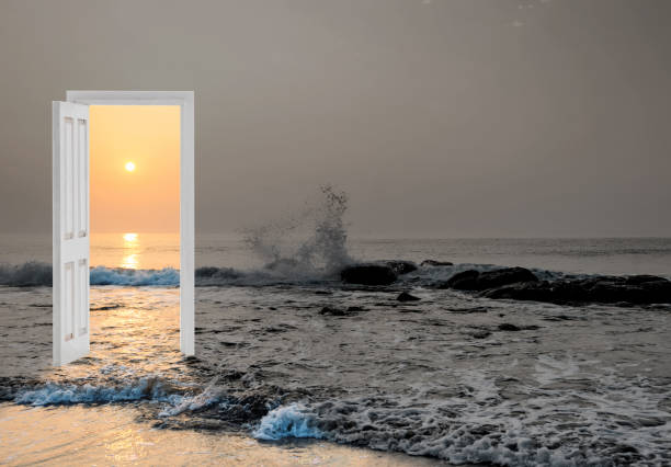 istock Open door with sunset sea 2025258364
