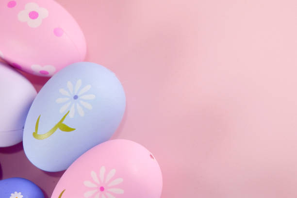 istock Pastel colorful Easter eggs on pink background stock photo copy space 2025268850