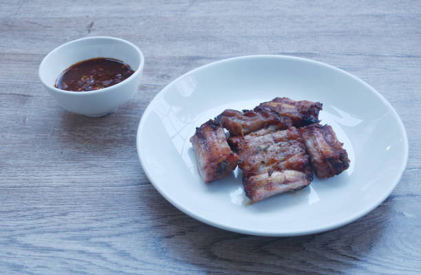 istock grilled pork bone slice dipping spicy chili sauce 2025277697