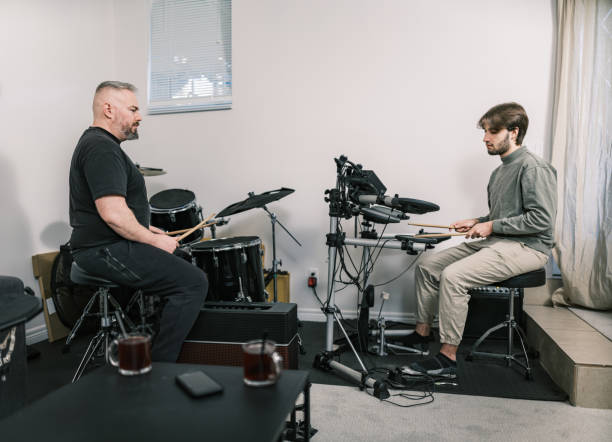 istock Male music teacher at drumming music studio 2025288367