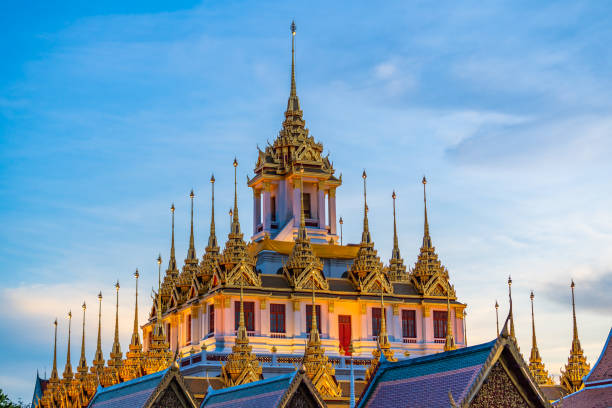 istock Beautiful sunset at Loha Prasat (metal castle) Wat Ratchanatda. The famous destination in Bangkok, Thailand. 2025300038
