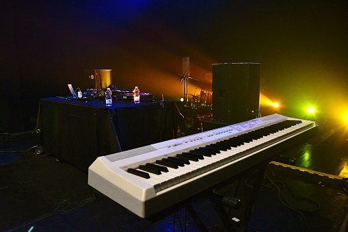 Keyboard, piano on stage