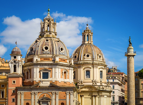 The baroque dome of Sant'Andrea della Valle in a view from Campo de Fiori square, in the historic center of Rome. Campo de Fiori is one of the most loved and visited areas by tourists from all over the world, characterized by the presence of noble palaces, countless churches and hidden treasures of Baroque art. Image in high definition format