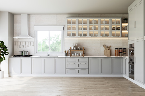 Modern vintage style empty kitchen 3d render, There are wooden floor, light gray counter cabinet with white marble top ,decorated with wooden kitchenware ,large window overlooking nature view