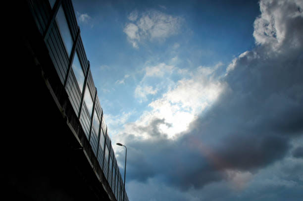 Highway with soundproof panels installed in sunlight
