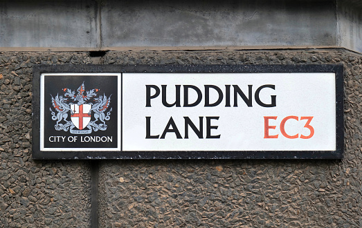 The current Pudding Lane road sign at the site of the great fire of London. Now a mixture of large office buildings.