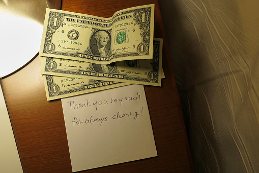 [Guam] A tip and a letter of gratitude placed by the bedside.