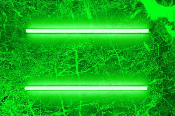 Two green neon light bulb on marble wall. Background texture of empty old marble wall with glowing green neon lamps.