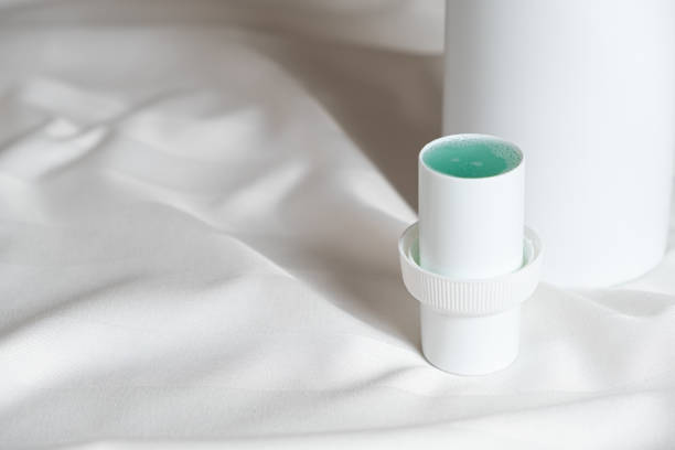 istock Natural liquid laundry detergent on a background of white satin fabric. 2025377908
