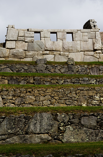 Three Windows Temple And Terraces Machu Picchu Peru South America With Overcast Sky