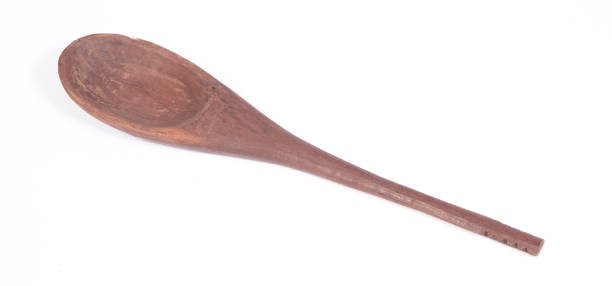 istock Old wooden spoon isolated on white 2025407650