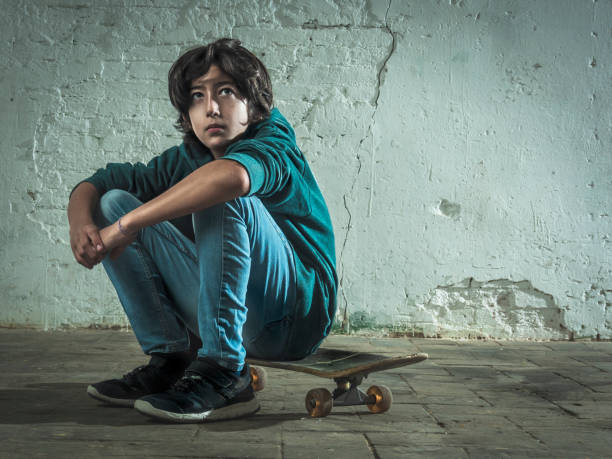 istock Young man sitting on his skateboard 2025413580