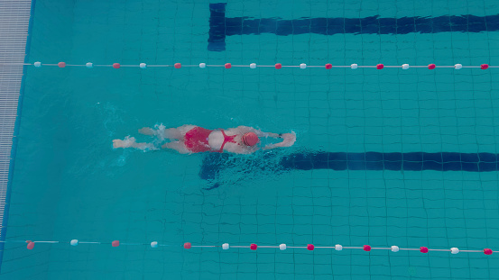 Young boy swimming the freestyle swim stroke