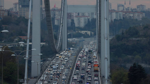 From a High Angle Perspective,the Bosphorus Bridge in Istanbul,Turkey,Emerges as a Vital Artery Connecting the Bustling Cityscape. As the Sun Dips Below the Horizon during Sunset,The Bridge Becomes a Hive of Activity,with Traffic Streaming in Both Directions