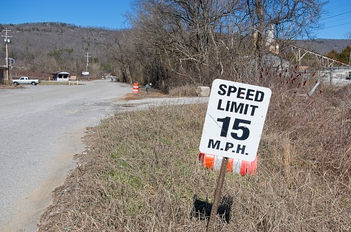 Speed limit sign on a rural road