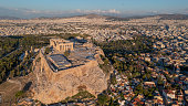 Drone aerial view of  the Acropolis of Athens during golden hour