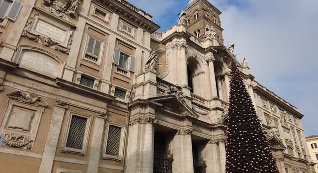 Basilica of Santa Maria Maggiore in Rome, Italy. Religious building exterior with Christmas tree.
