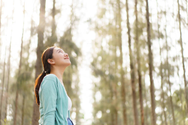 istock Asian young woman relaxing in nature. 2025453302