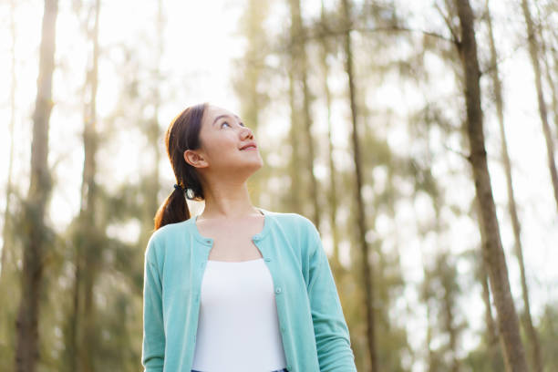 istock Asian young woman relaxing in nature. 2025453319